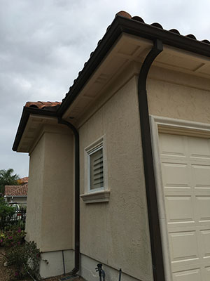 A home with new gutter installations in Houston, TX